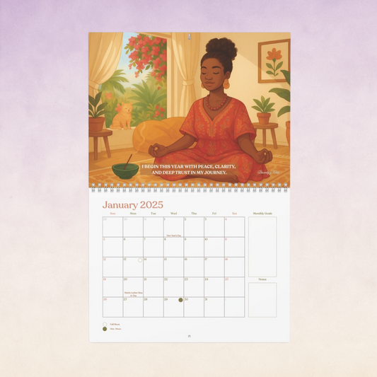 Sweet Synchronicity 2025 wall calendar open to January, featuring an illustration of a meditating Black woman with a cat nearby and affirmation text, against a soft lavender ombre background.